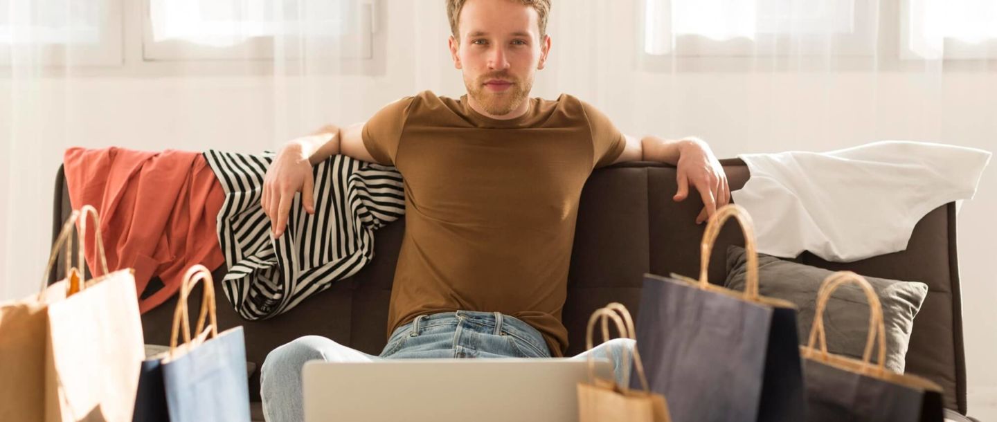An image representing man purchasing merchandise on headless ecommerce platform